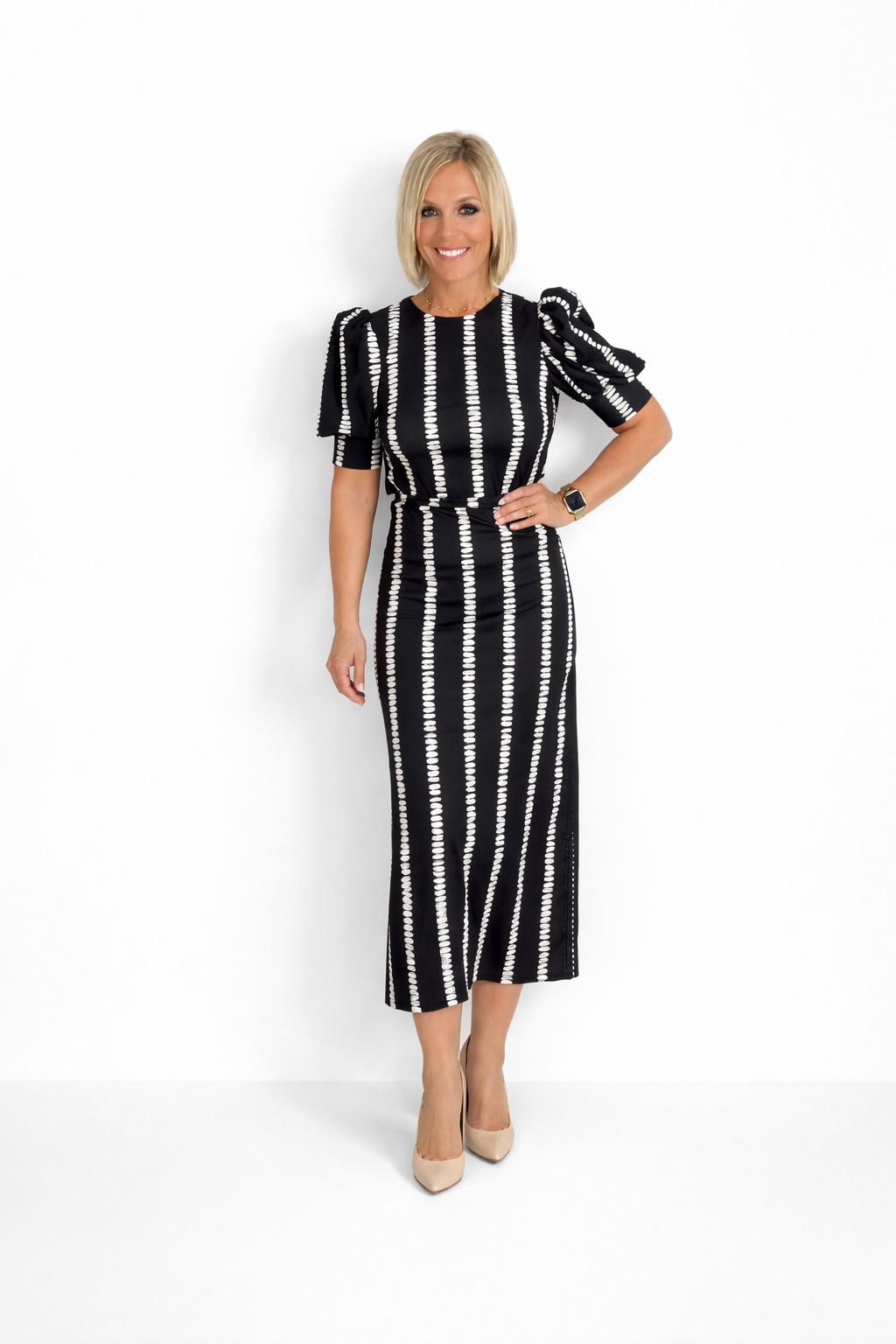 Conjunto top y falda negro estampado blanco