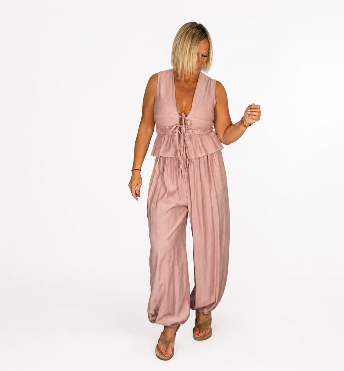 Conjunto camisa frunce y pantalón bombacho rosa palo