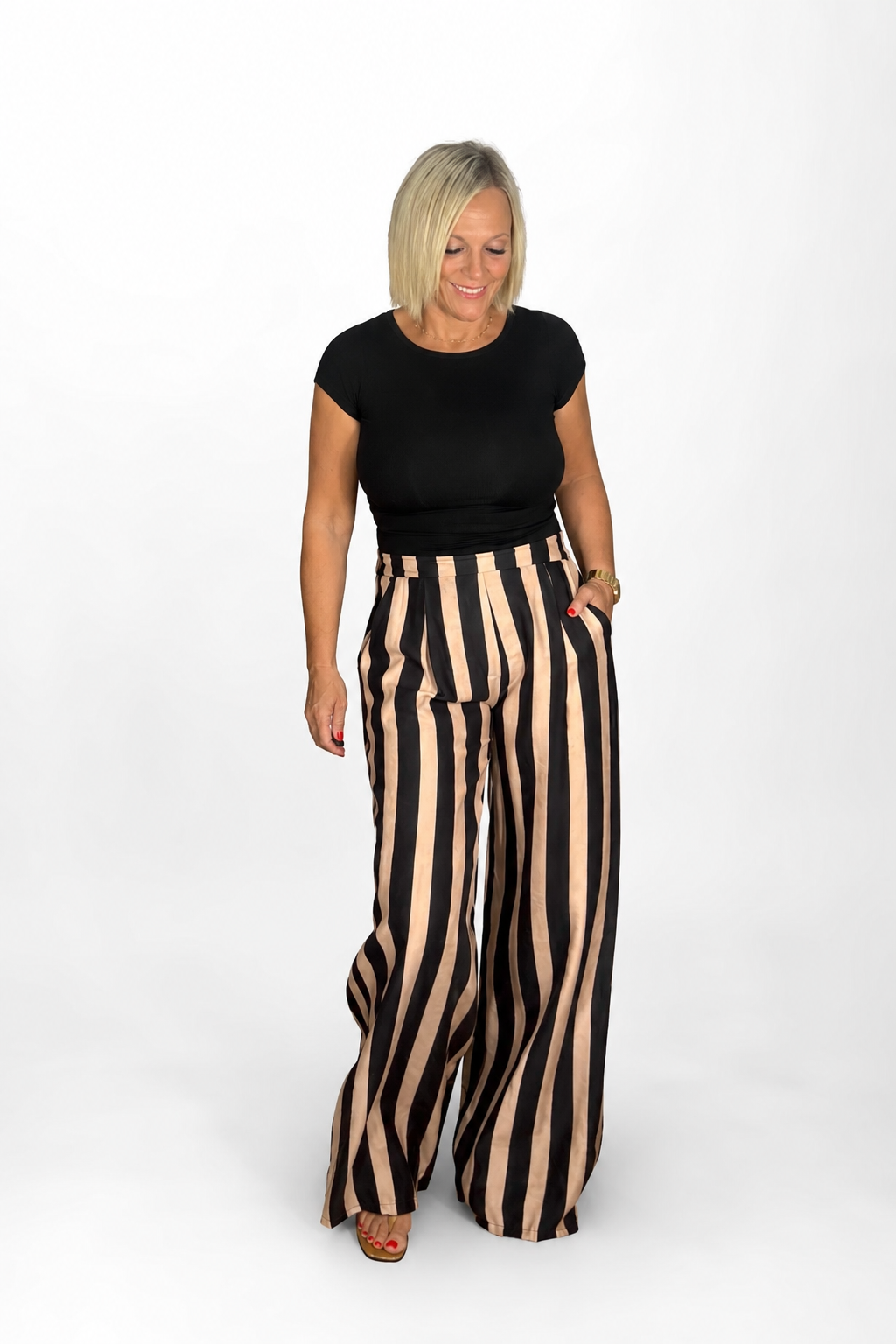 Pantalón fluido rayas beige y negro